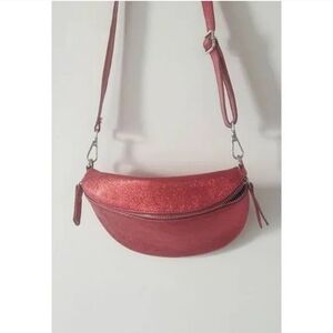 Metallic Red Cross bodybag.